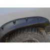 Rubber seal for wheel arch extensions